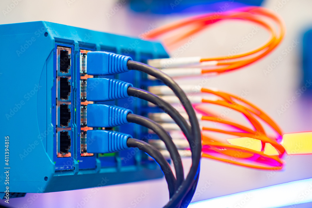 Telecommunication equipment close up. Blue telecommunication hub close ...