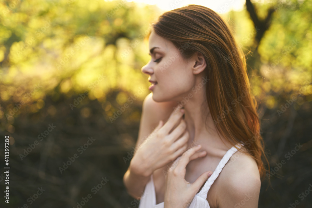 happy woman resting in nature in the forest vacation sun trees happy woman resting in nature in the forest vacation sun trees