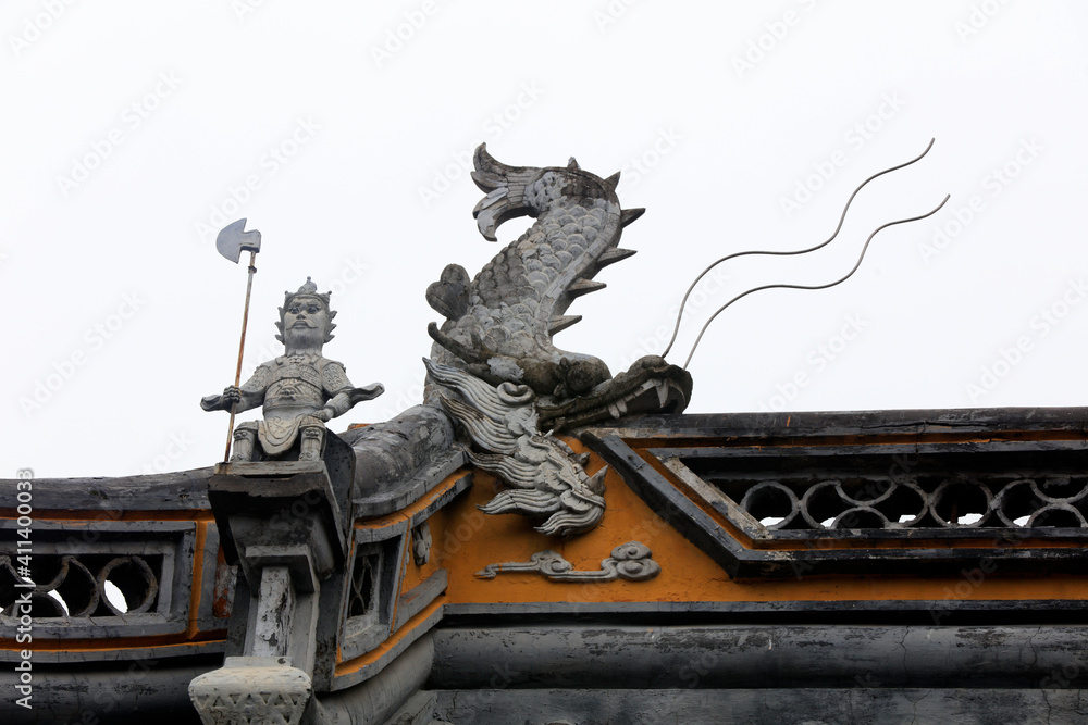 Exquisite sculptures on eaves, Chenxiang Pavilion, Shanghai, China