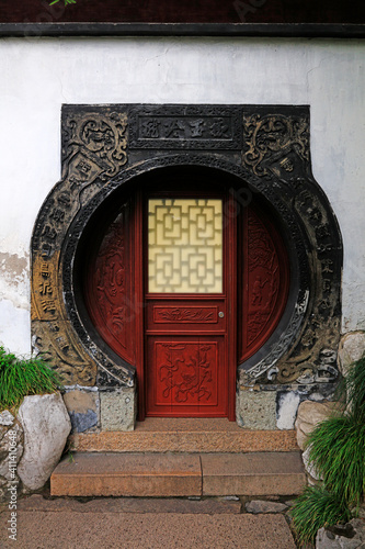 Architectural landscape of Chinese traditional moon gate in Yu Garden, Shanghai, China