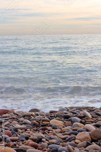 Pebbles stones on the seashore.
