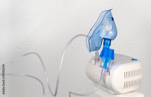 nebulizer that performs inhalation using the spray of a medicinal substance. it is used in the treatment of bronchial asthma and respiratory diseases. breathing mask for performing procedures.