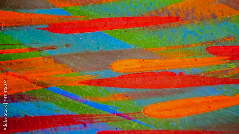 Many different colored lines painted bright paint on canvas close-up. Green, orange, red, blue colors. Brush strokes on canva. Cracks, scratches. Abstract grunge multicolored creativity art background Many different colored lines painted bright paint on canvas close-up. Green, orange, red, blue colors. Brush strokes on canva. Cracks, scratches. Abstract grunge multicolored creativity art background