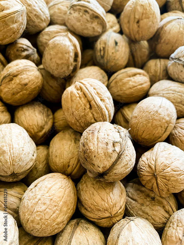 Walnuts on the market or harvest festival. Overhead view Walnuts on the market or harvest festival. Overhead view
