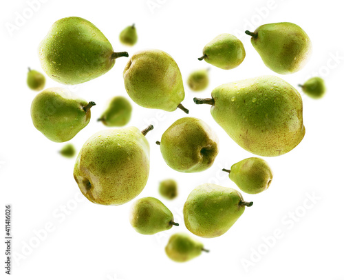 Ripe pears in the shape of a heart on a white background