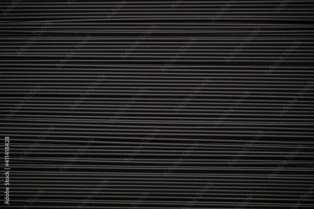 Black spaghetti background. Spaghetti squid ink Black spaghetti background. Spaghetti squid ink