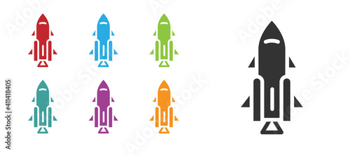 Black Rocket ship with fire icon isolated on white background. Space travel. Set icons colorful. Vector.