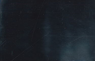 Dust scratches overlay. Old film effect. Dark aged texture with smeared faded stains pattern. Distressed grunge chalkboard design.