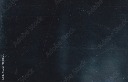 Dust scratches overlay. Old film effect. Dark aged texture with smeared faded stains pattern. Distressed grunge chalkboard design. photo