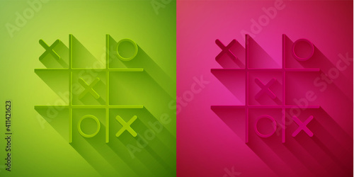 Paper cut Tic tac toe game icon isolated on green and pink background. Paper art style. Vector.