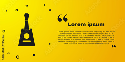 Black Musical instrument balalaika icon isolated on yellow background. Vector.
