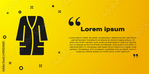 Black Bathrobe icon isolated on yellow background. Vector.
