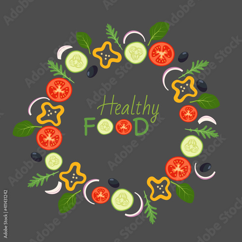 Vegetable round frame with tomatoes, cucumbers and spinach leaves, arugula on a dark background