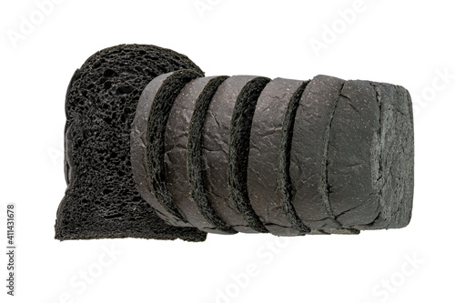 Organic homemade charcoal black bread isolated on white background.