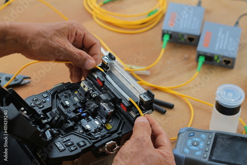 fusion splicer for fiber optic cable conection by welding photo