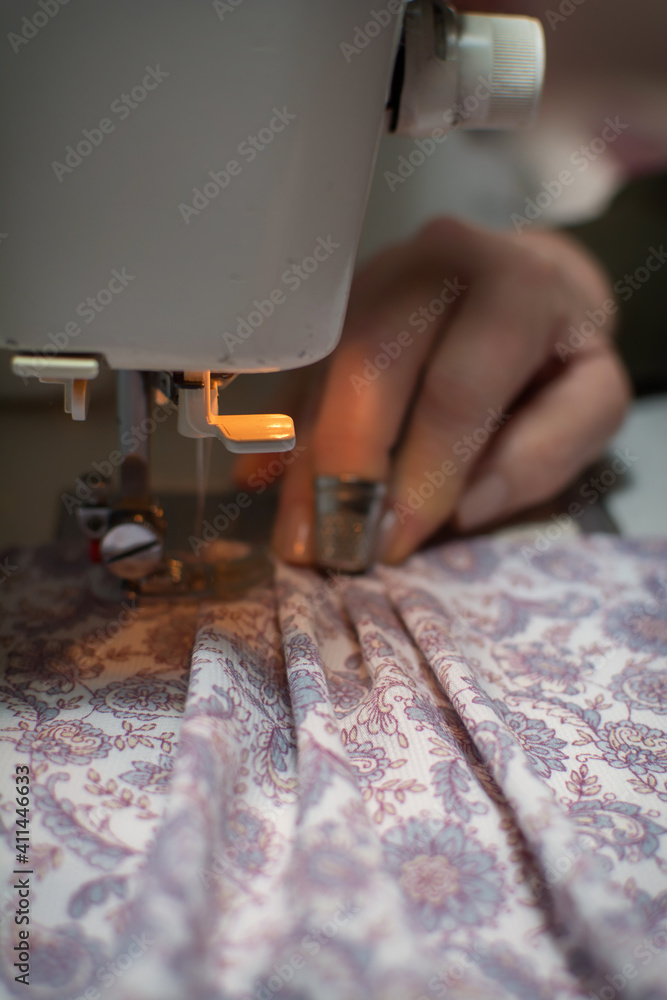 Obraz premium Hands Of A Dressmaker Creating A New Design Of Clothes. Sewing workshop.