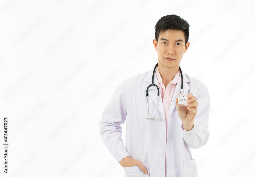Portrait of Asian male doctor in white gown coat holding a bottle of coronavirus covid-19 vaccine in hand pose on white background. Portrait of Asian male doctor in white gown coat holding a bottle of coronavirus covid-19 vaccine in hand pose on white background.