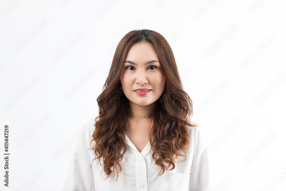 Portrait of a curly hair beautiful and cute middle-aged woman posing and looking to camera with charming and self-confidence Portrait of a curly hair beautiful and cute middle-aged woman posing and looking to camera with charming and self-confidence