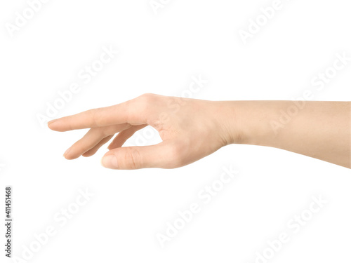 Female hand reaches for something or points to something isolated on a white background