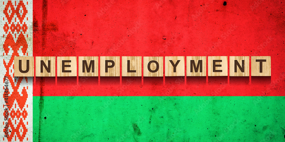 Obraz premium Unemployment. The inscription on wooden blocks on the background of the Belarus flag. Unemployment growth. Business.