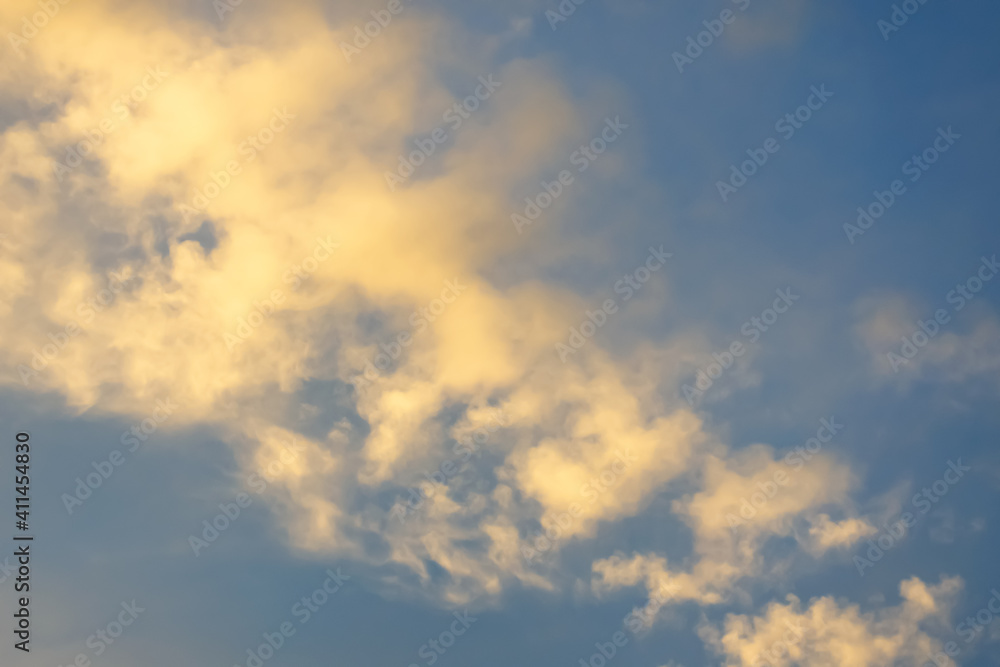 Beautiful clouds in the sunset sky. Close-up.