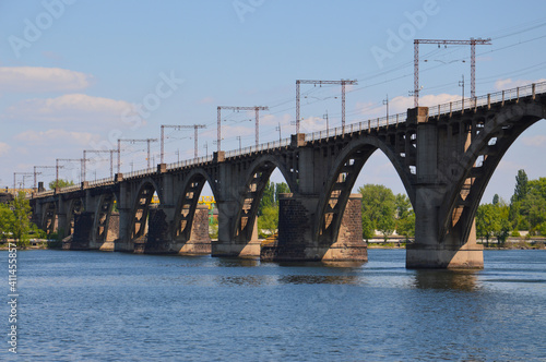 Railway bridge over the Dnieper river from downview photo