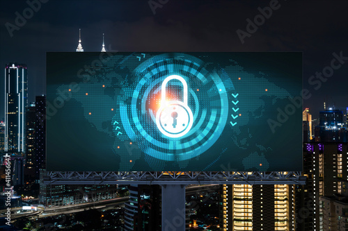 Photography Padlock icon hologram on road billboard over panorama city view of Kuala Lumpur at night to protect business, Malaysia, Asia