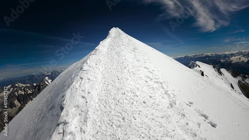 4K POV footage of snow trail arriving at the summit of Mont Blanc in the mountains of Mont Blanc massif.
Gopro view, mid angle, traveling movement.