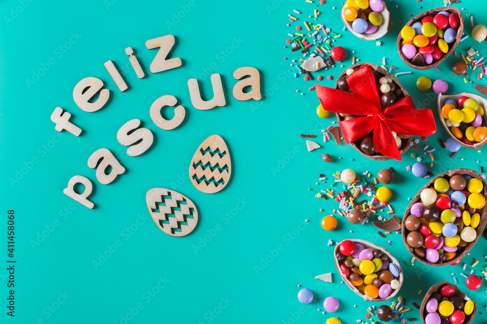 Festive Easter background with chocolate eggs and sweets Festive Easter background with chocolate eggs and sweets