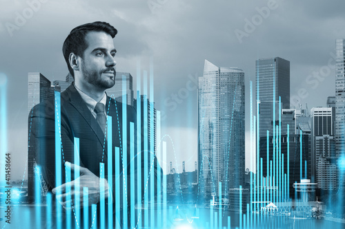 Prosperous Caucasian trader in suit in crossed arms pose dreaming about positive behavior of stock market. Trading at corporate finance fund. Forex chart. Singapore. Double exposure.