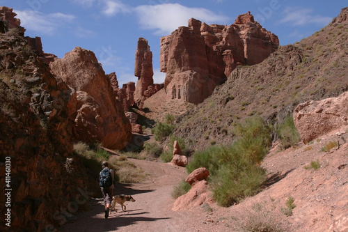 Charyn Canyon in South East Kazakhstan, summer 2019. Trail in red rock canyon desert. Red rock canyon desert trail landscape. Yellow-red rocks in Kazakhstan.