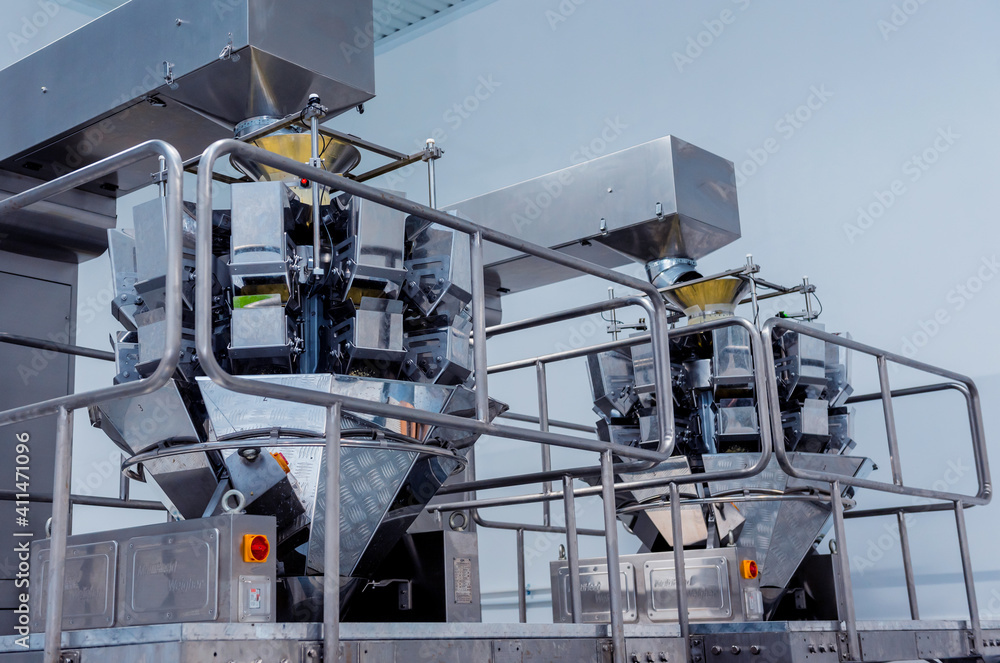 Vertical multi-head weigher packaging machine snacks and chips in a factory
