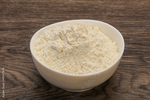 Wheat flour heap in the bowl