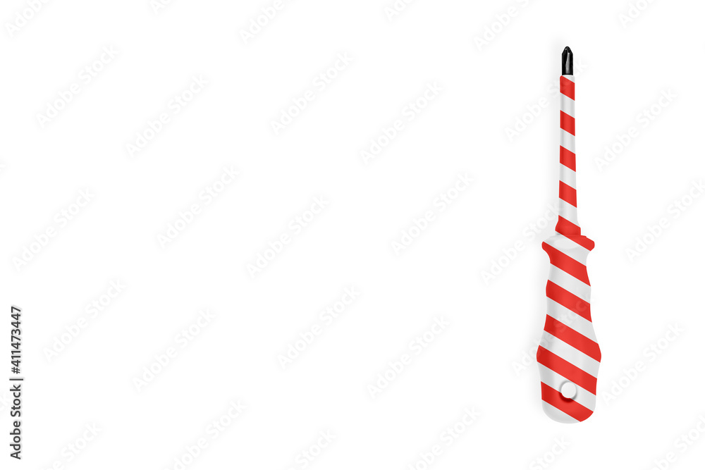 Obraz premium Metal screwdriver with a striped rubberized handle. Background on the theme of tools, service, repair. 