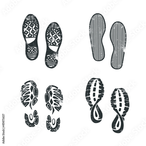Collection of boot prints isolated on white. Vector illustration.