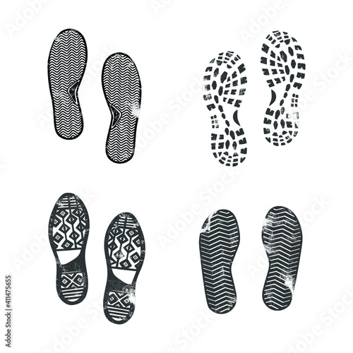 Collection of boot prints isolated on white. Vector illustration.