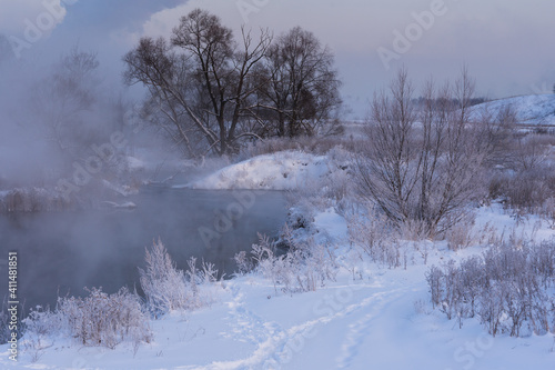 Winter morning over the river © Evgenii Ryzhenkov