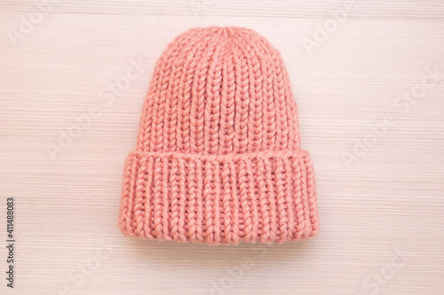 Pink women s wool hat on white background