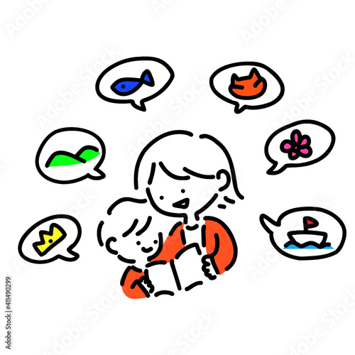 読み聞かせをする親子