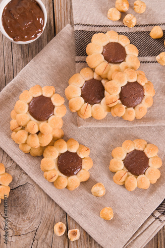 Fototapeta Naklejka Na Ścianę i Meble -  Flower shaped chocolate biscuits.