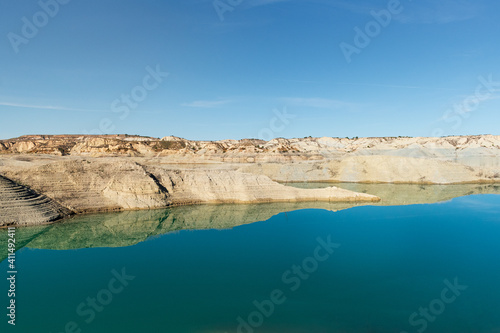 Blue lake in a desert-like area, oasis