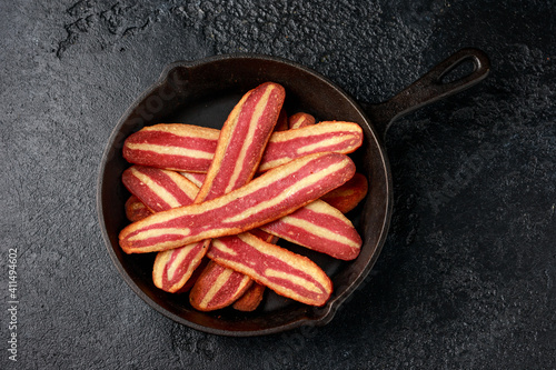 Quadro em tela Fried crunchy plant based vegan Bacon pieces in a cast iron skillet