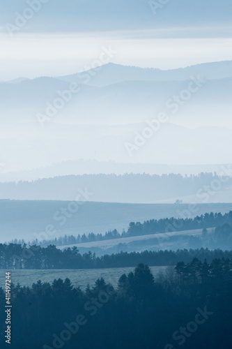 Landscape with mountains with fog