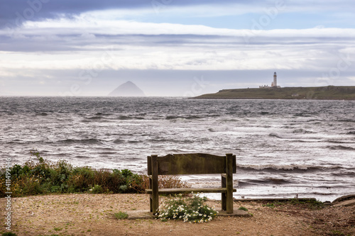 Obraz na plátně seat with view of Ailsa Craig and lighthouse on Arran