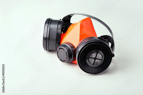 Respirator on gray surface. Personal protection equipment.