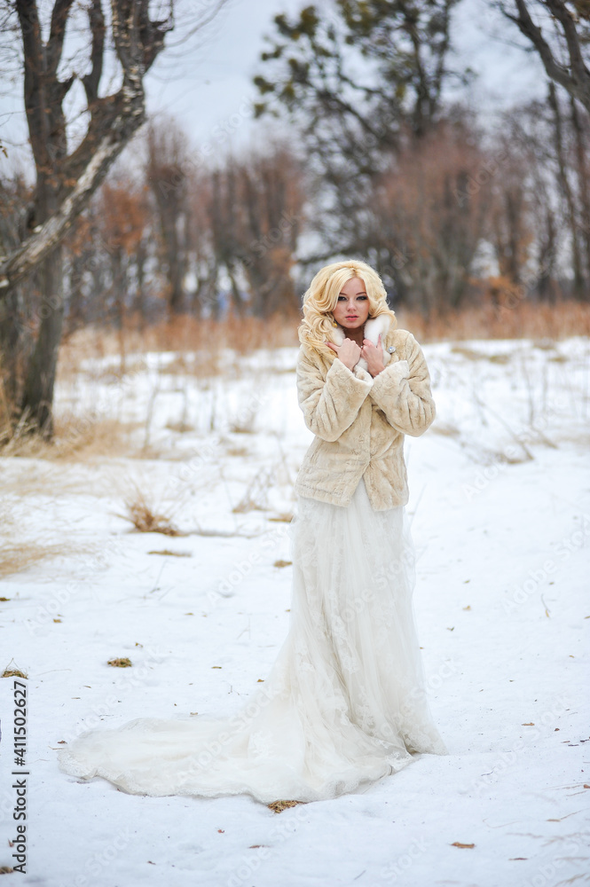 Beautiful bride near old castle on winter day wedding Beautiful bride near old castle on winter day wedding