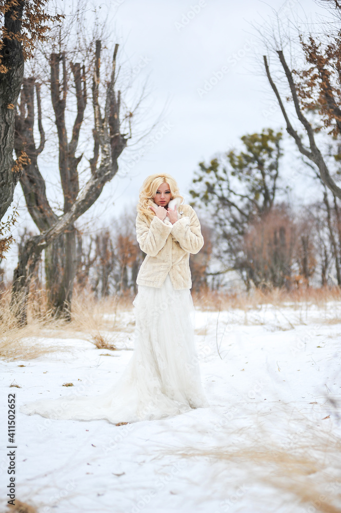 Beautiful bride outdoors on winter day