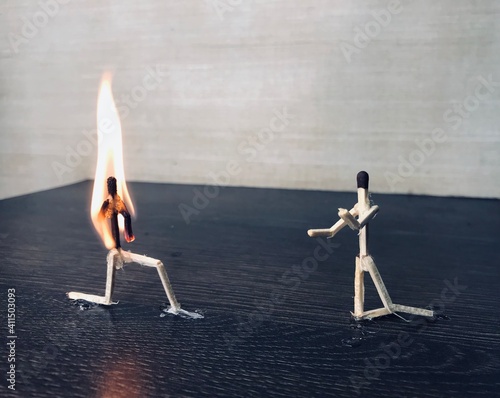 matchstick couple in flame photo