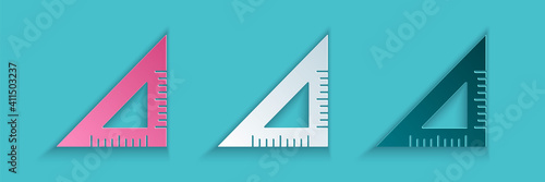 Paper cut Triangular ruler icon isolated on blue background. Straightedge symbol. Geometric symbol. Paper art style. Vector.