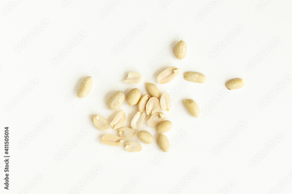 Group of peeled peanuts isolated on white background. Group of peeled peanuts isolated on white background.